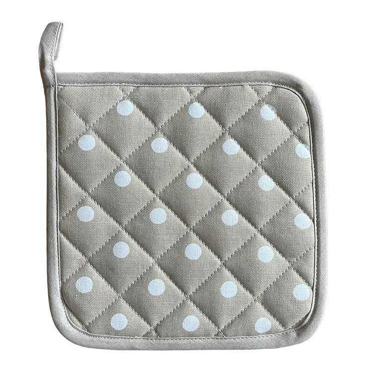 Pannenlap beige met stippen / Kracht